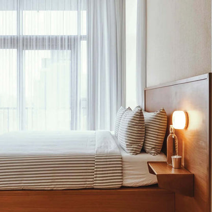 DimpleGlow | Stilren Dimpelvegglampe for Moderne Interiør